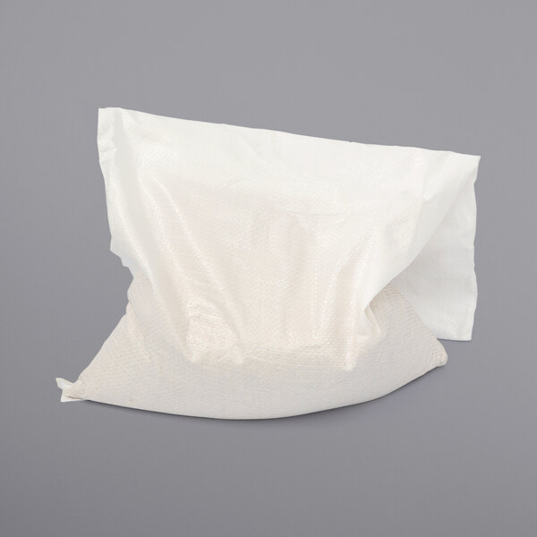 A white bag of Sammic vegetable granulate with a white surface.