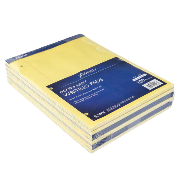 A stack of yellow lined Ampad writing pads.