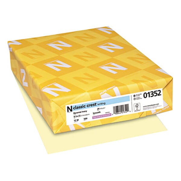 A yellow box with white letters and designs for Neenah Classic Crest Baronial Ivory Copy Paper.