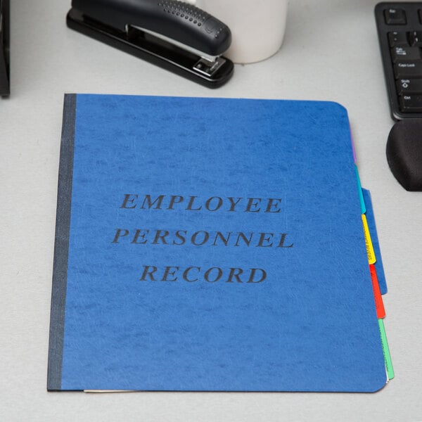 A blue Pendaflex folder with black text reading "Personnel"