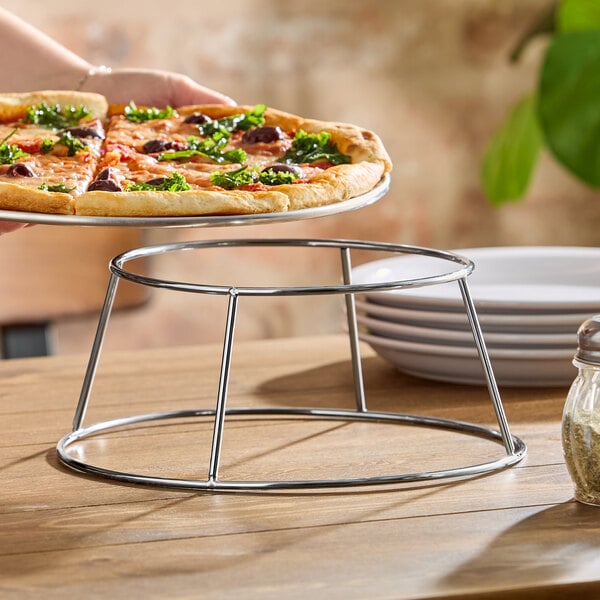 A 4-inch chrome plated steel display stand for holding items such as pizza trays.