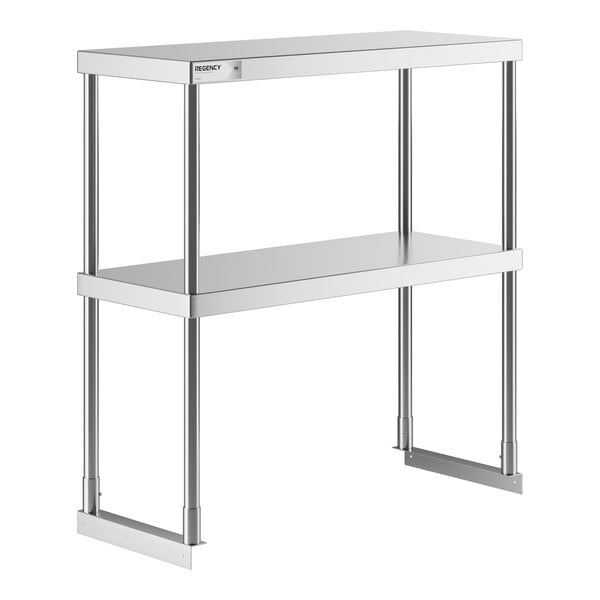 A Regency stainless steel table mounted double deck overshelf with metal legs and shelves.
