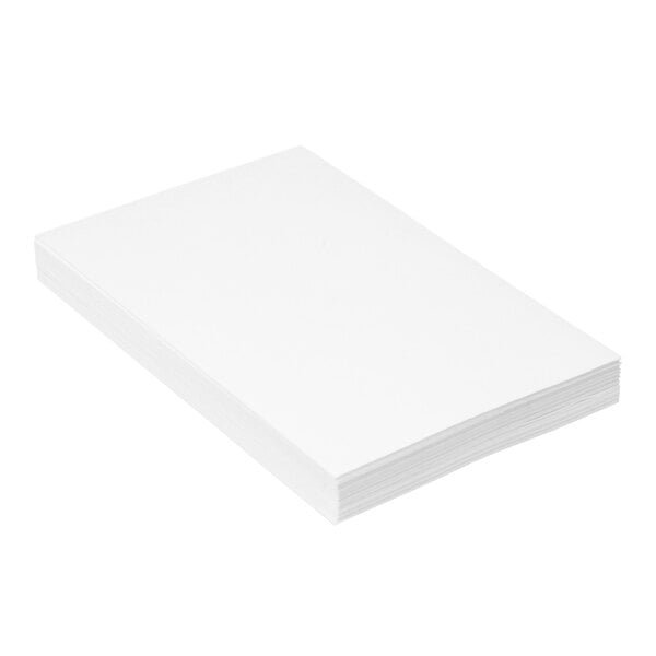 A stack of plain white rectangular index cards.