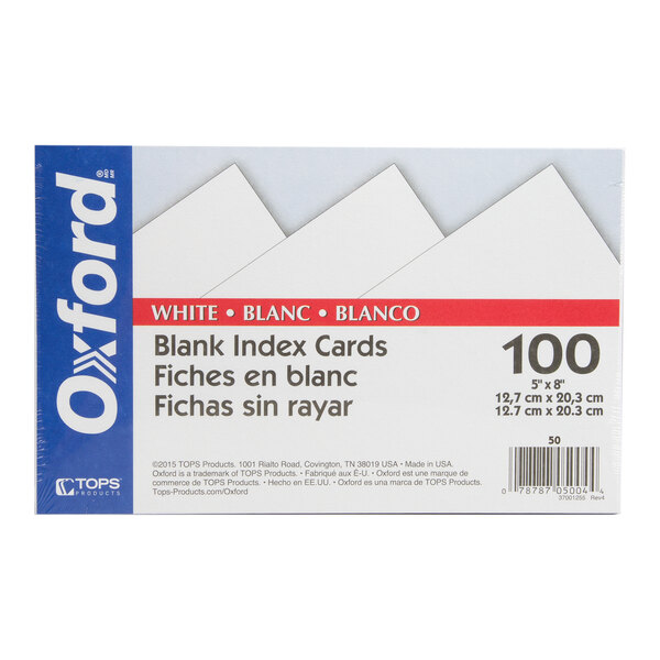 A package of 100 white blank index cards measuring 5 x 8 inches, labeled in English, French, and Spanish.