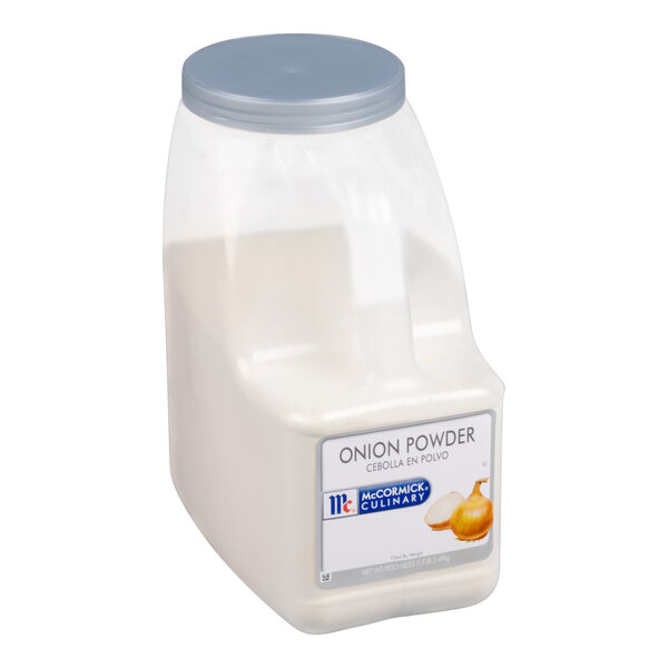A large plastic container with a gray lid, filled with a white powder and labeled as onion powder.