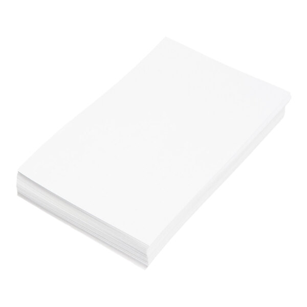 A stack of plain white rectangular index cards.