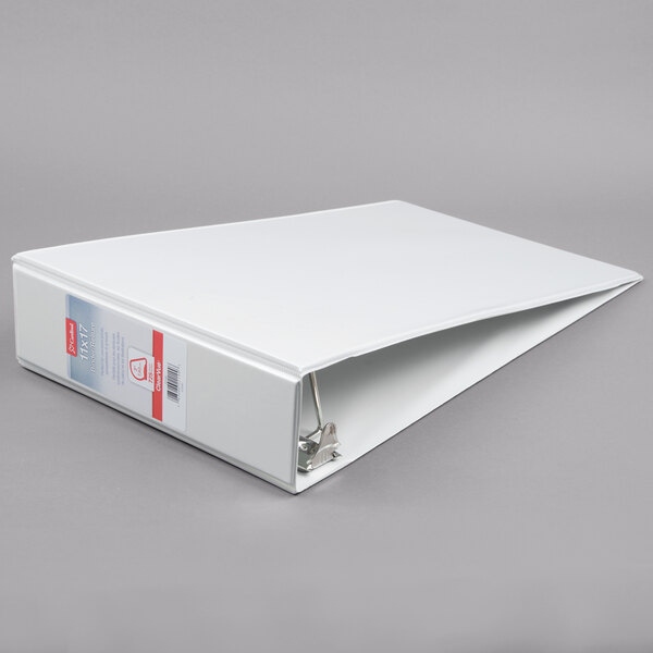 A white Cardinal tabloid binder with a red label.