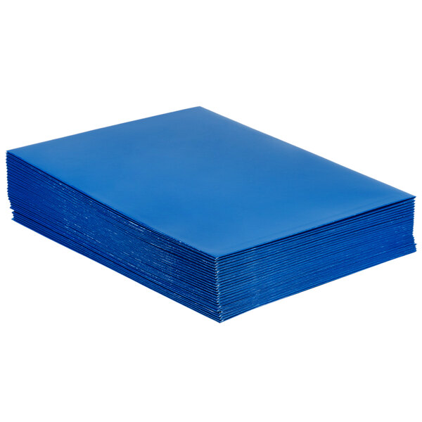A stack of Oxford blue paper folders.
