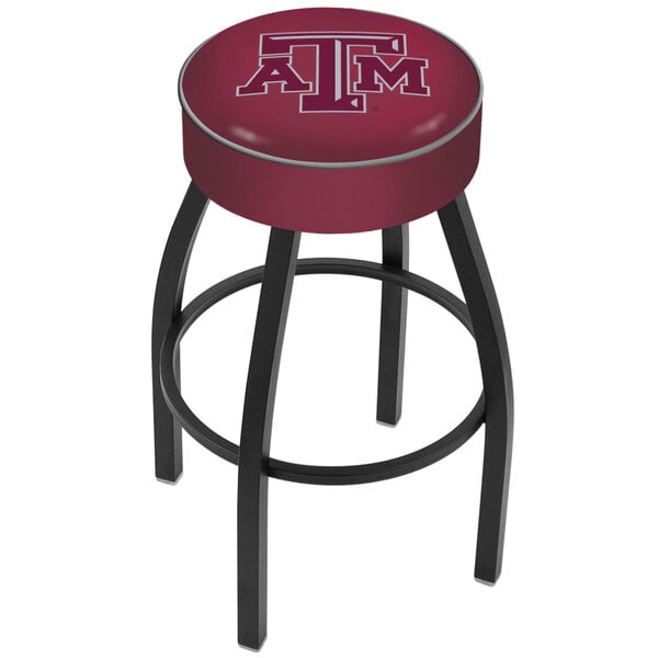 A Texas A&M University bar stool with a logo on the seat.