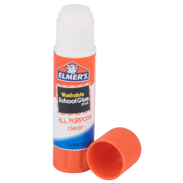 An Elmer's clear plastic bottle with a label on it and a glue stick cap.