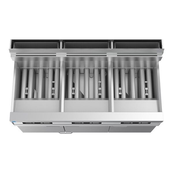 A commercial natural gas floor fryer system with three units, digital controls, and an integrated filtration system.