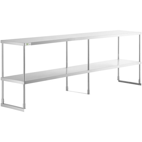 A Regency stainless steel double deck overshelf with metal legs and three shelves.