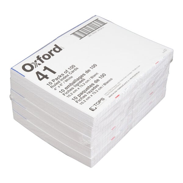 A stack of white ruled index cards in packaging labeled 'Oxford 41' with details about quantity and size.