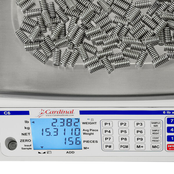 A Cardinal Detecto digital counting scale on a counter.