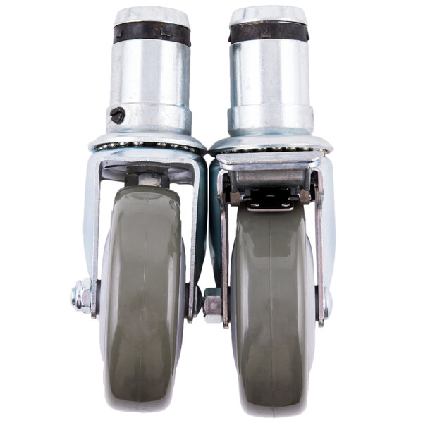 A pair of Vulcan metal swivel stem casters with metal wheels.