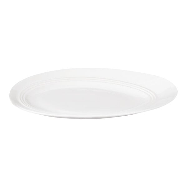 A white oval plate with a slightly raised rim and subtle concentric detailing.