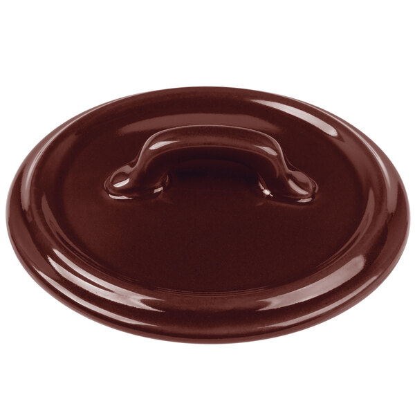 A Bon Chef burnt umber porcelain cocotte lid with a handle.