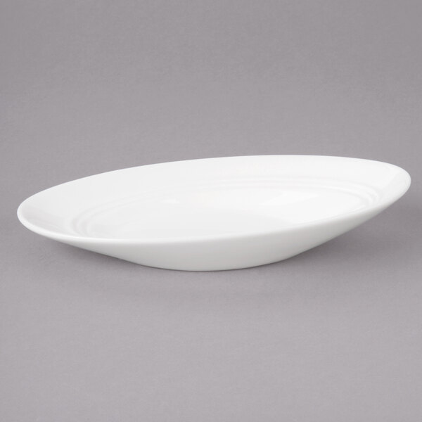 A white Bon Chef oval china bowl.