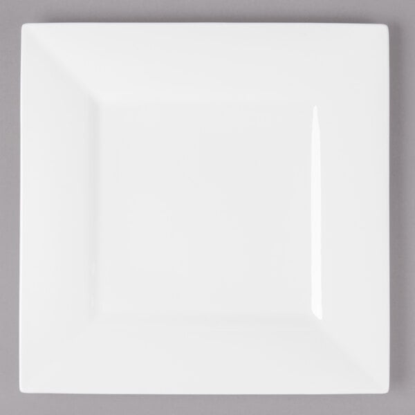 A white rectangular Bon Chef bone china square plate with a white rim.