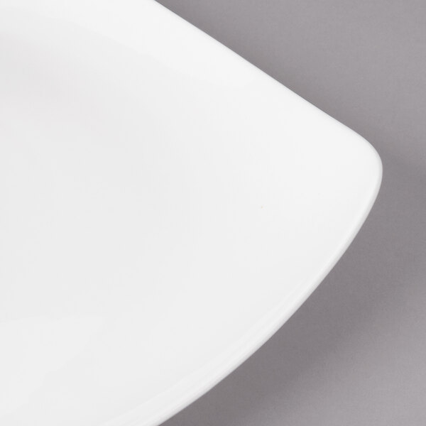A close up of a white Bon Chef porcelain dinner plate.