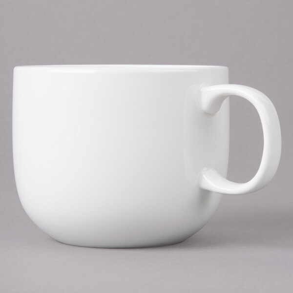A white Bon Chef cappuccino cup with a handle.