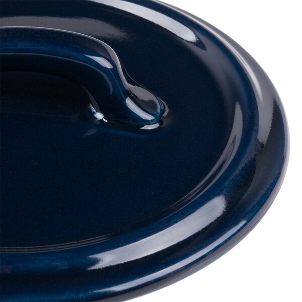 A close-up of a Bon Chef cobalt blue porcelain lid.