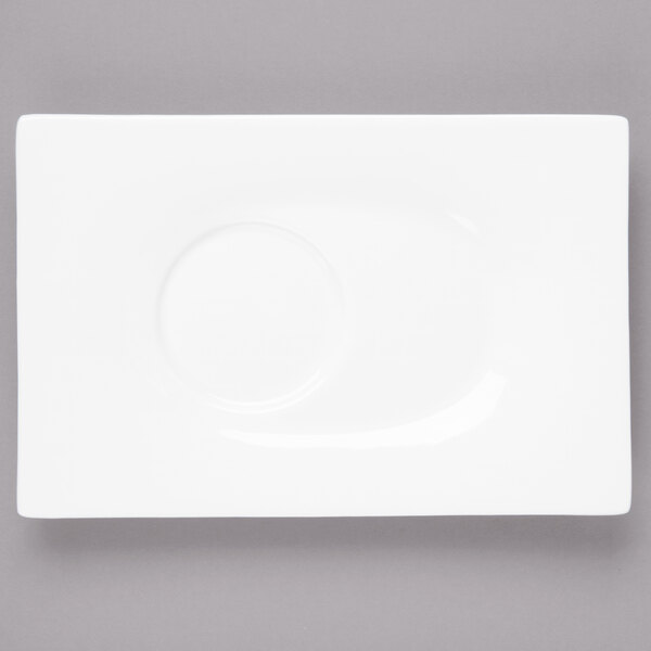 A white rectangular plate with a circle in the middle.