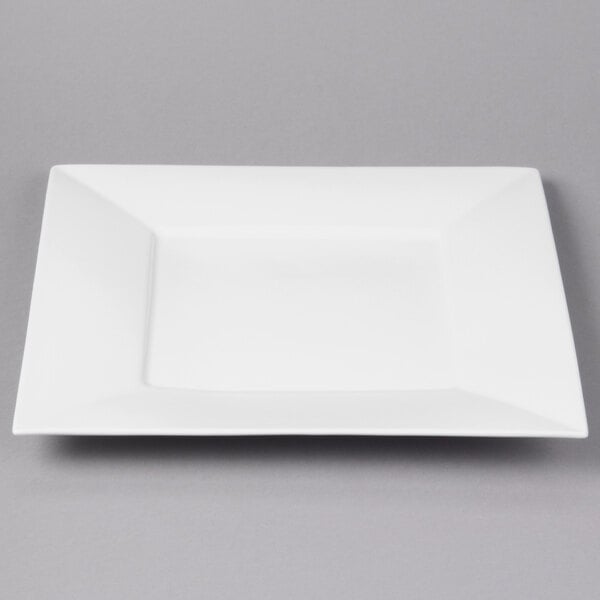 A white square Bon Chef bone china plate with a wide rim.