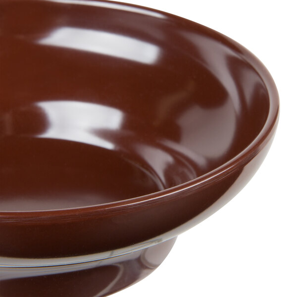 A brown Thunder Group melamine bowl.