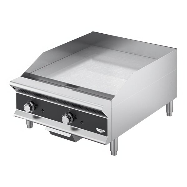 A Vollrath Cayenne heavy duty countertop griddle with manual controls.