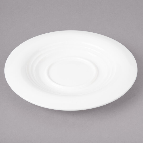 A white Bon Chef porcelain saucer with a circular pattern.