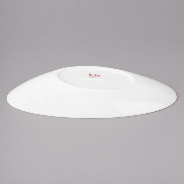 A white Bon Chef slanted oval porcelain bowl.