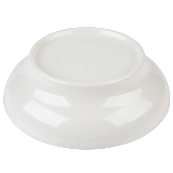 A white bowl with a round lid.