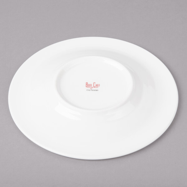 A white Bon Chef porcelain bread and butter plate with a round rim.