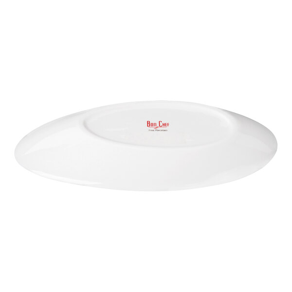 A white, oval-shaped porcelain plate with a slightly slanted design and a small logo in the center.