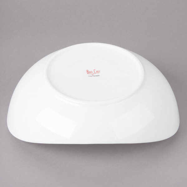 A white Bon Chef pasta bowl on a gray background.