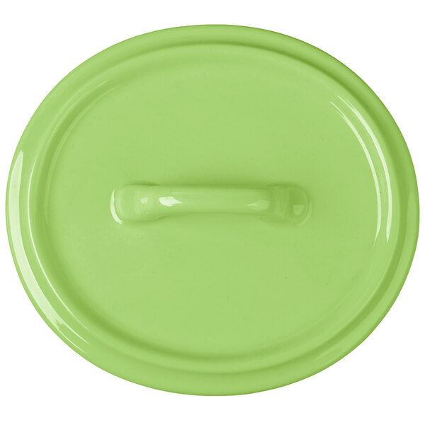 A green Bon Chef porcelain oval cocotte lid with a handle.