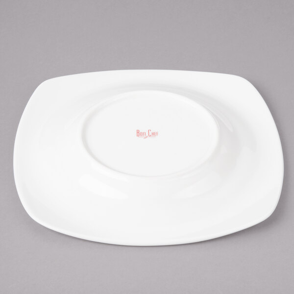 A white Bon Chef soft square porcelain plate.