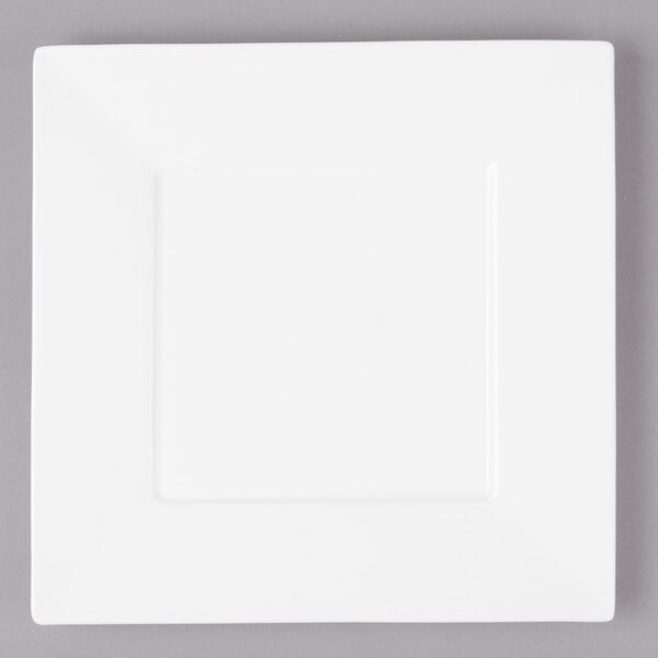 A white square Bon Chef bone china plate with a wide rim.