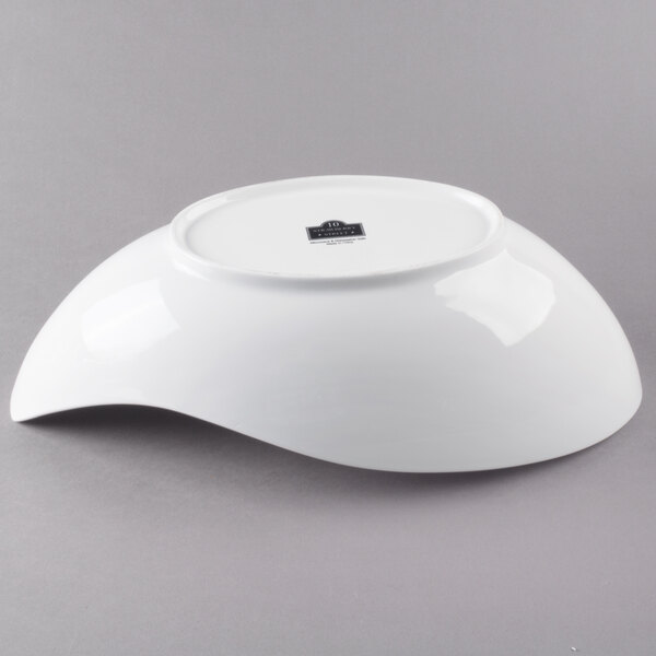 A white 10 Strawberry Street canoe bowl.