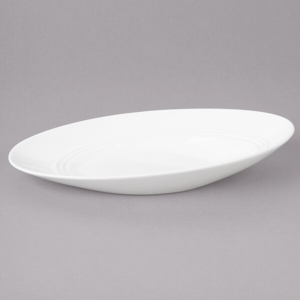 A white oval shaped Bon Chef porcelain bowl.