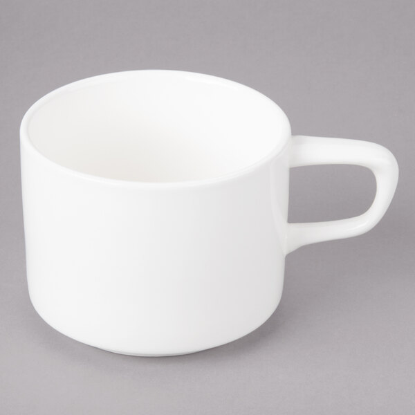 A white Bon Chef porcelain cup with a handle.