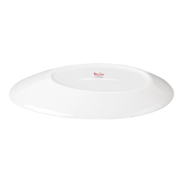 A white, oval-shaped porcelain plate with a slanted design and a glossy finish.
