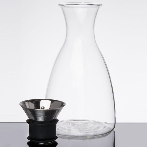 A GET Silhouette glass decanter with a dripless stainless steel lid.