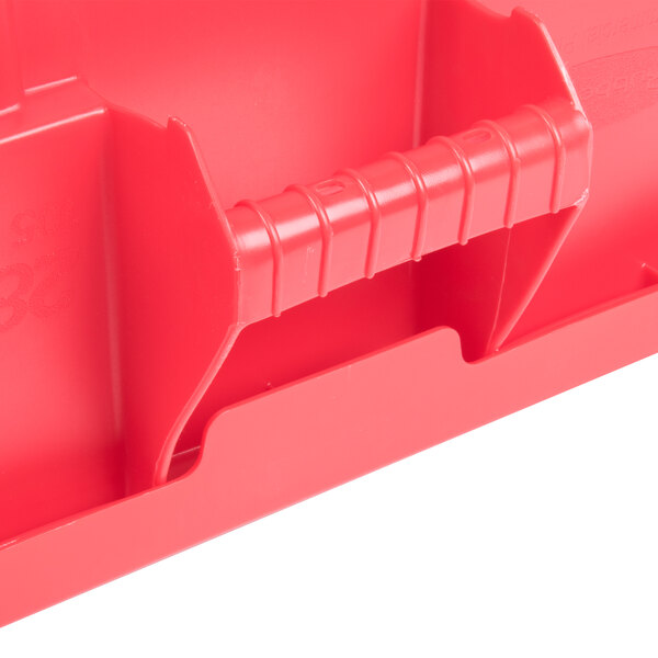 A red Rubbermaid BRUTE square trash can with a snap-lock lid.