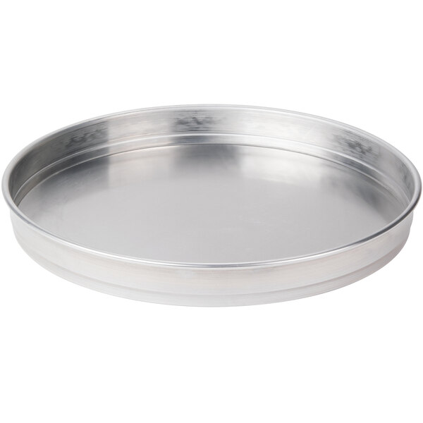 An American Metalcraft round silver aluminum cake pan.