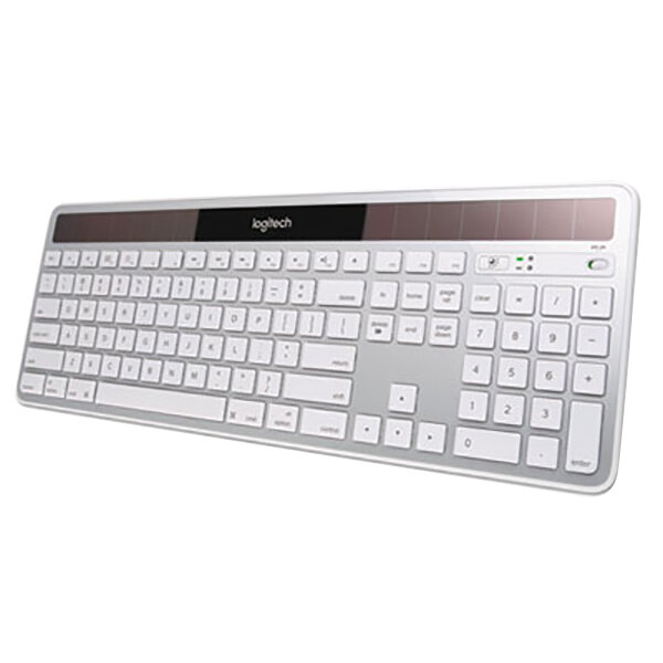 A close-up of a white Logitech full size wireless solar Mac keyboard.