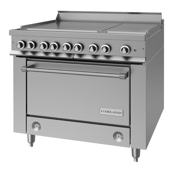 A heavy-duty stainless steel electric range with six boiler top sections and a standard oven.