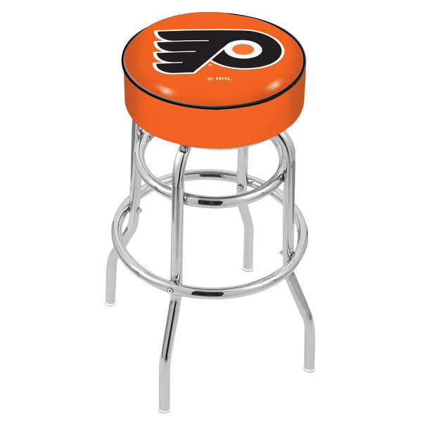 A Holland Bar Stool Philadelphia Flyers swivel bar stool with a logo on the seat.