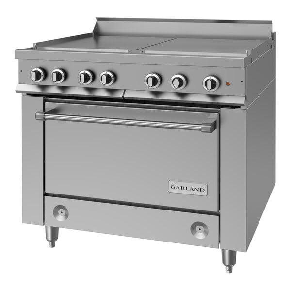 A heavy-duty stainless steel electric range with four boiler top sections and a standard oven.